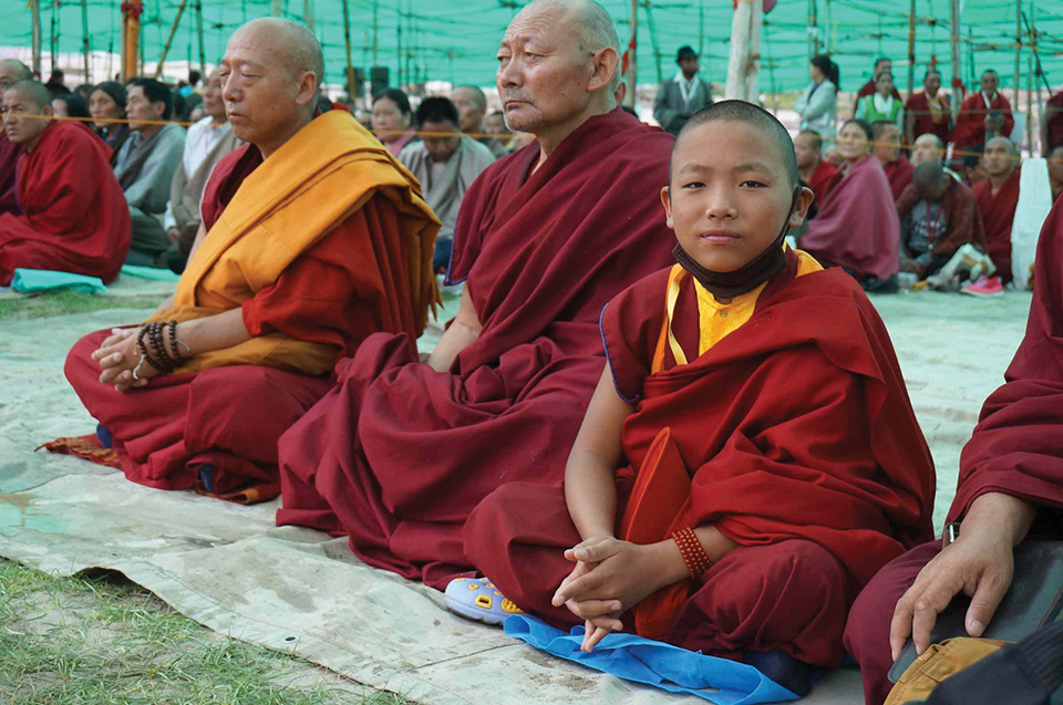 Dr. Grieve is interested in how religion intersects with the modern world. In 2014, the head of the UNCG Department of Religious Studies traveled to Ladakh at the foot of the Himalayas to observe the Dalai Lama address the masses — those physically present and those livestreaming the event. [Photo provided by Grieve.] 