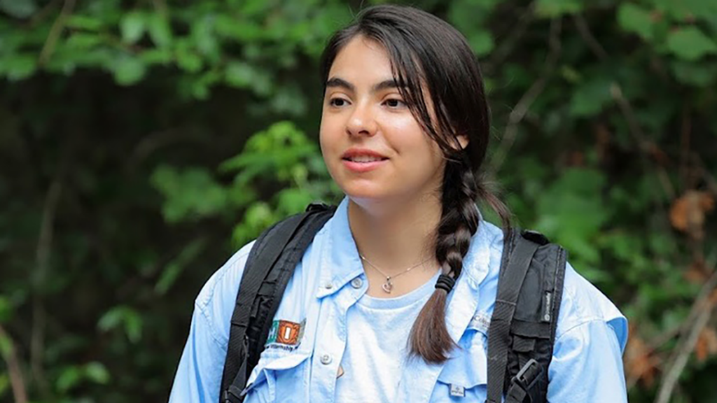 Student out in the forest.