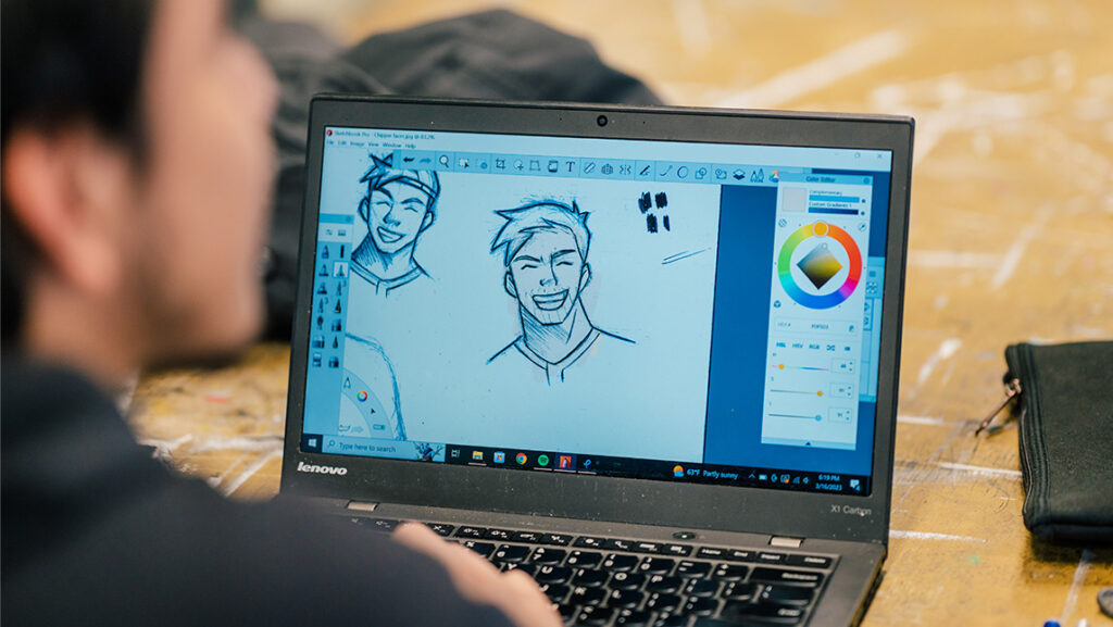 Over-the-should view of a laptop with a sketch animation.