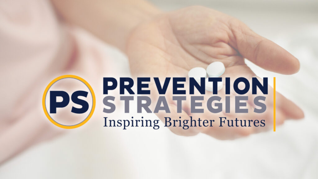 A handing holding pills with Prevention Strategies: Inspiring Brighter Futures and logo in front