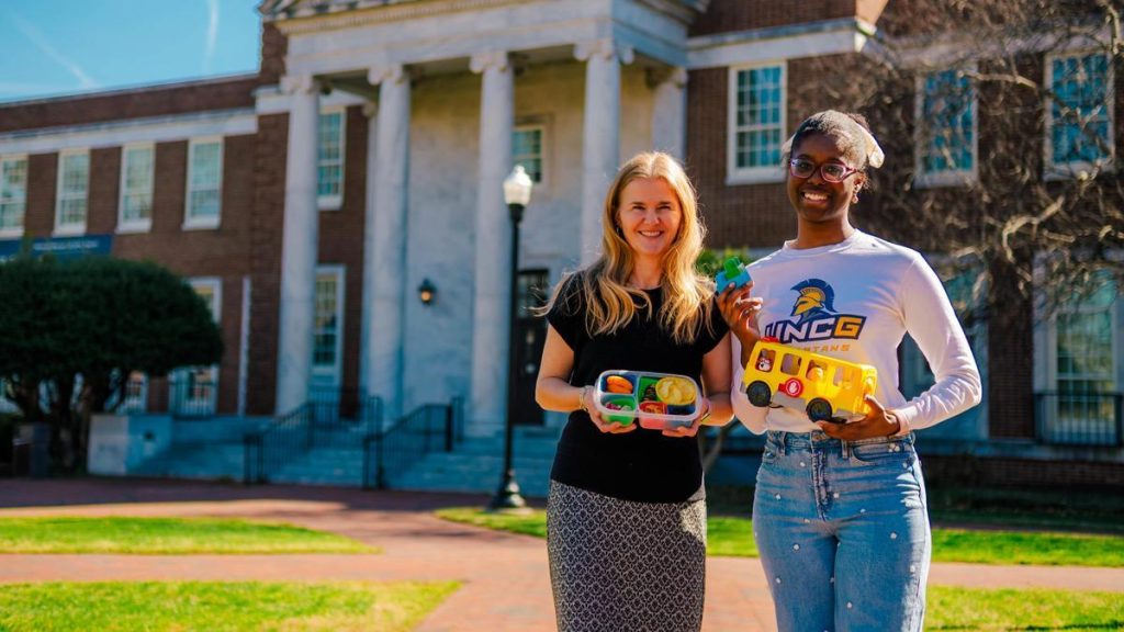 Dr. Lenka Shriver and Jahleen Gourdine hold iGrow test materials